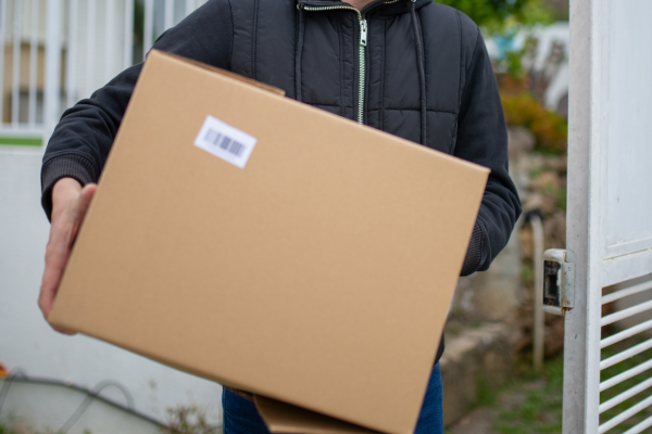 Man carrying cardboard box